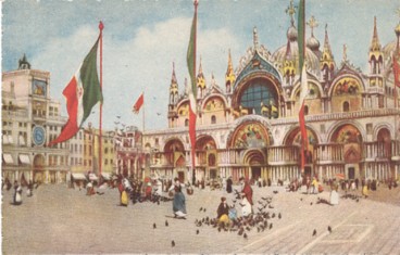 Featured is a postcard image of Italian flags flying at the Piazza of San Marco in front of St. Mark's Basilica in Venice, Italy.  The original c 1920's postcard is for sale in The unltd.com Store.  